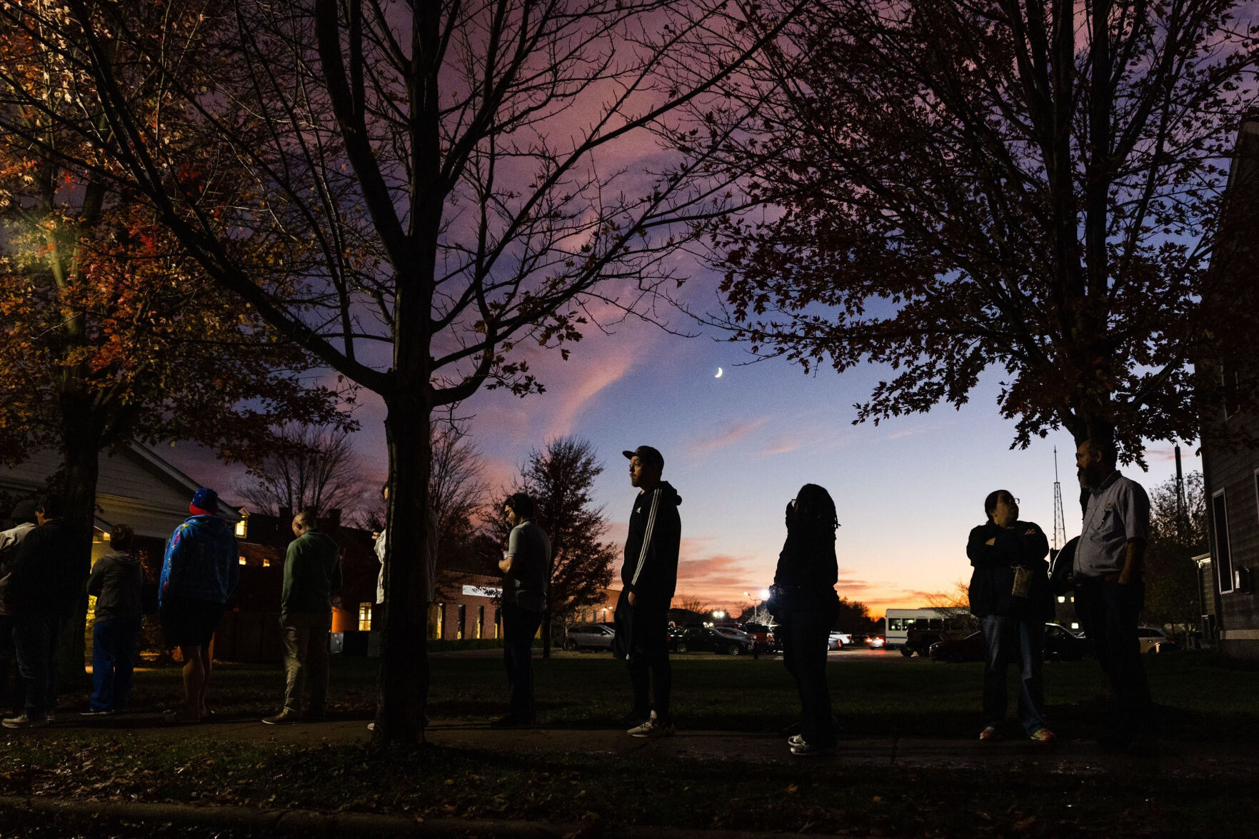 Evening voters wait to cast ballots on election night in St. Charles